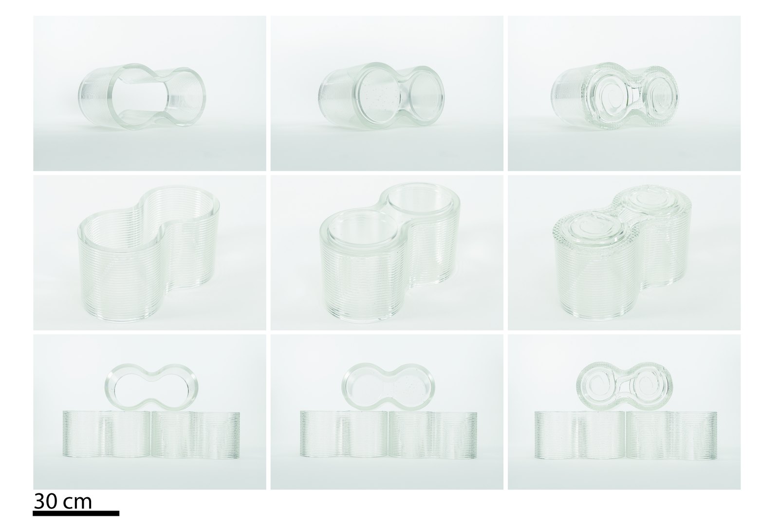 Nine clinical views of the interlocking glass masonry unit with a 30 cm scale bar